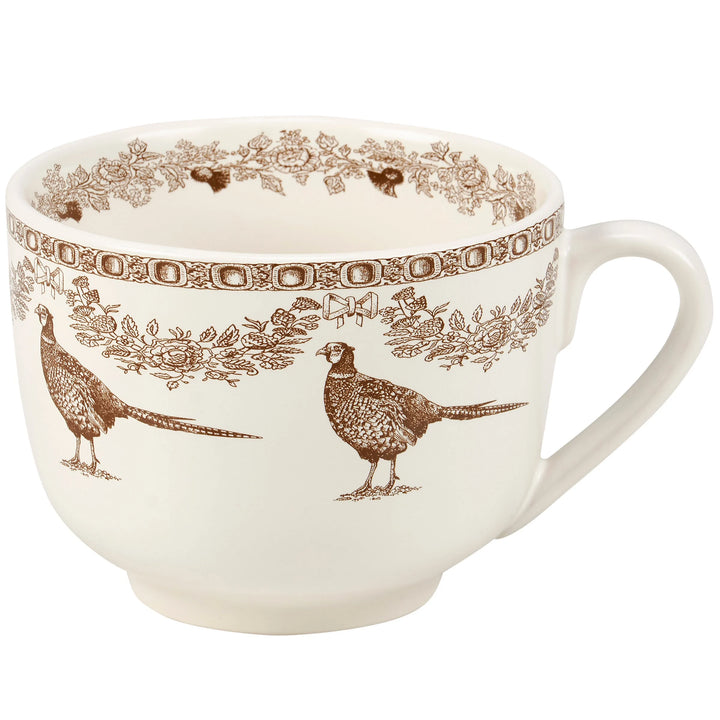 White mug with brown pheasant and floral pattern on a white background