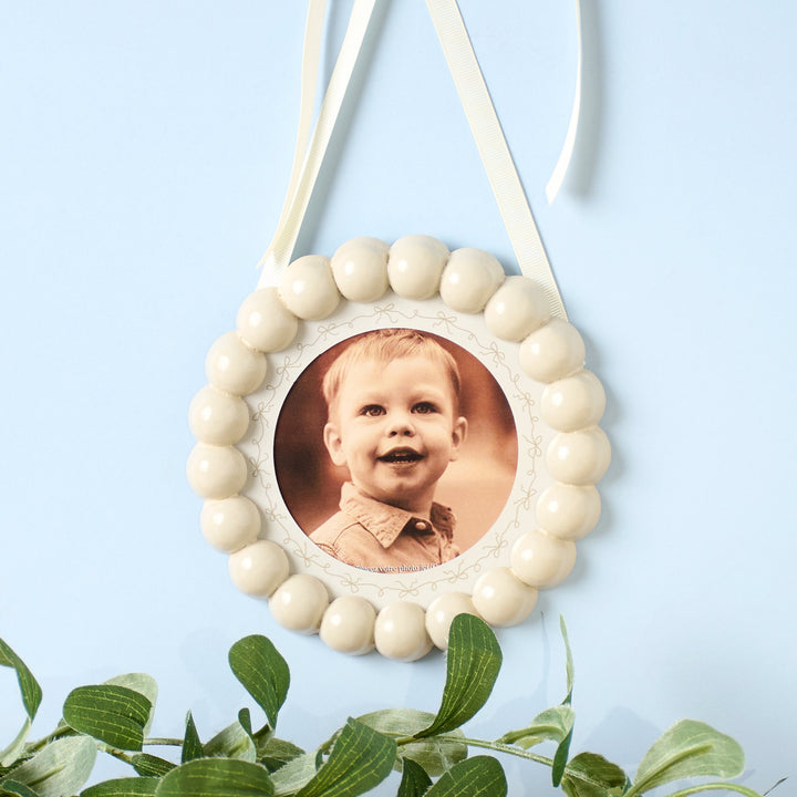 CREAM BEADED ROUND WALL FRAME
