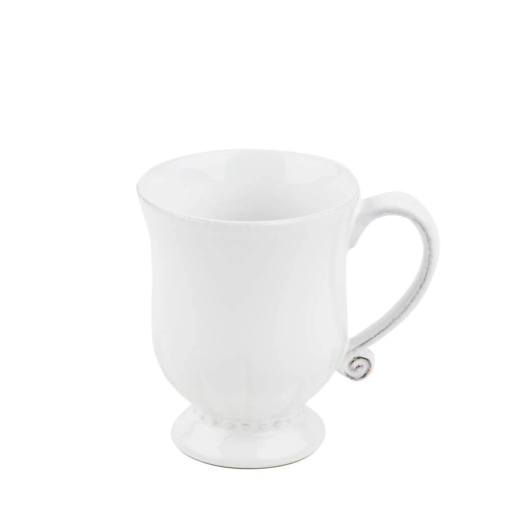 White ceramic mug with a handle on a white background