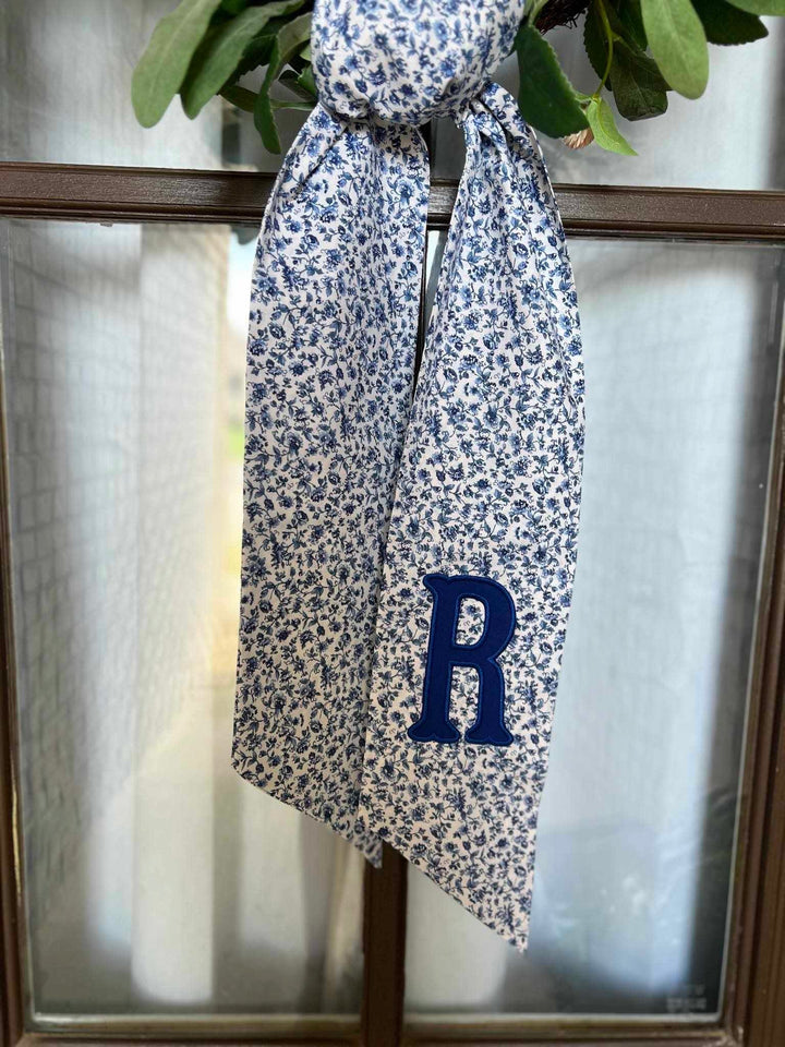 BLUE ON WHITE WREATH SASH