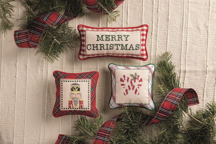 Three decorative needlepoint throw pillows Christmas themed.
