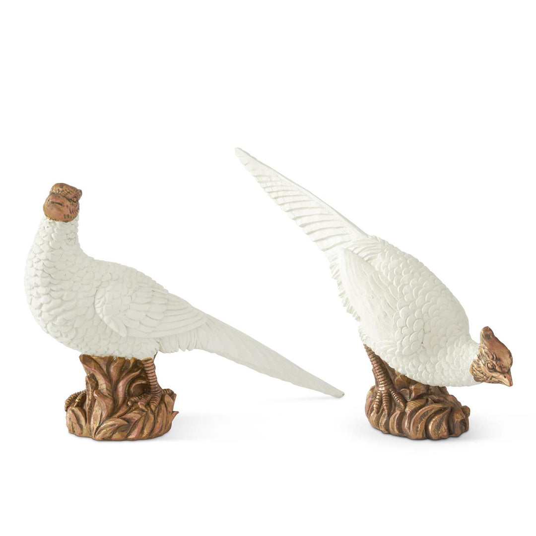Two ceramic pheasant figurines on a white background