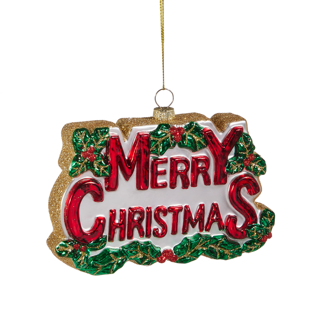 Decorative Christmas ornament with 'Merry Christmas' text and holly leaves on a white background