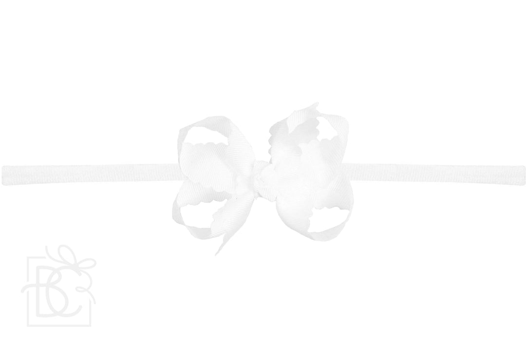 WHITE SCALLOPED EDGE PANTYHOSE HEADBAND BOW