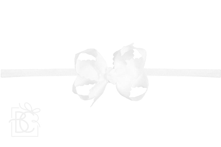 WHITE SCALLOPED EDGE PANTYHOSE HEADBAND BOW