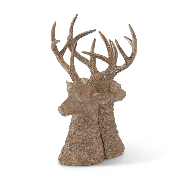 Decorative deer head with large antlers on a white background