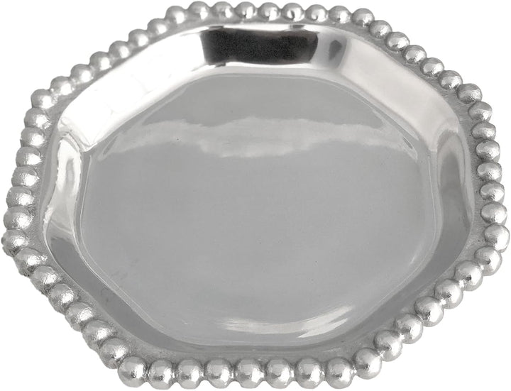 Silver decorative plate with beaded edge on a white background