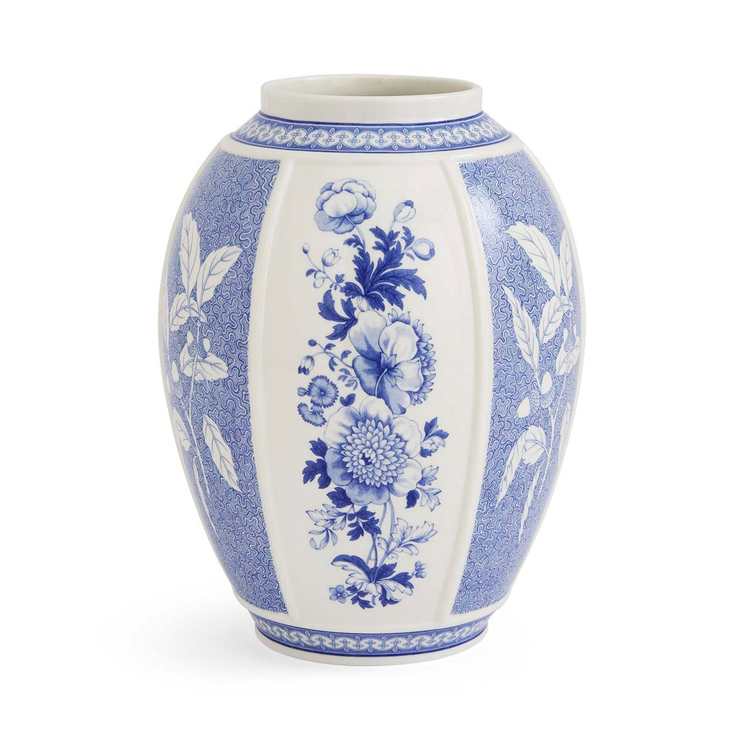 A 10-inch blue and white porcelain vase with a floral pattern, featuring a panel design.