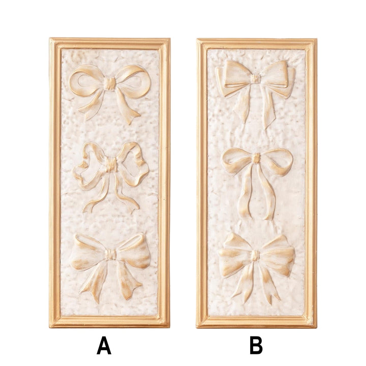 Two decorative wall panels with bow designs on a white background