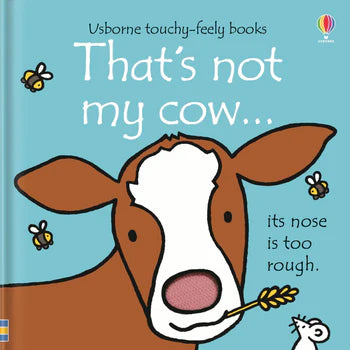 Book cover of 'That's not my cow' with a cow illustration and text.