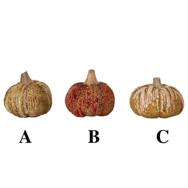 Three decorative pumpkins labeled A, B, and C on a white background
