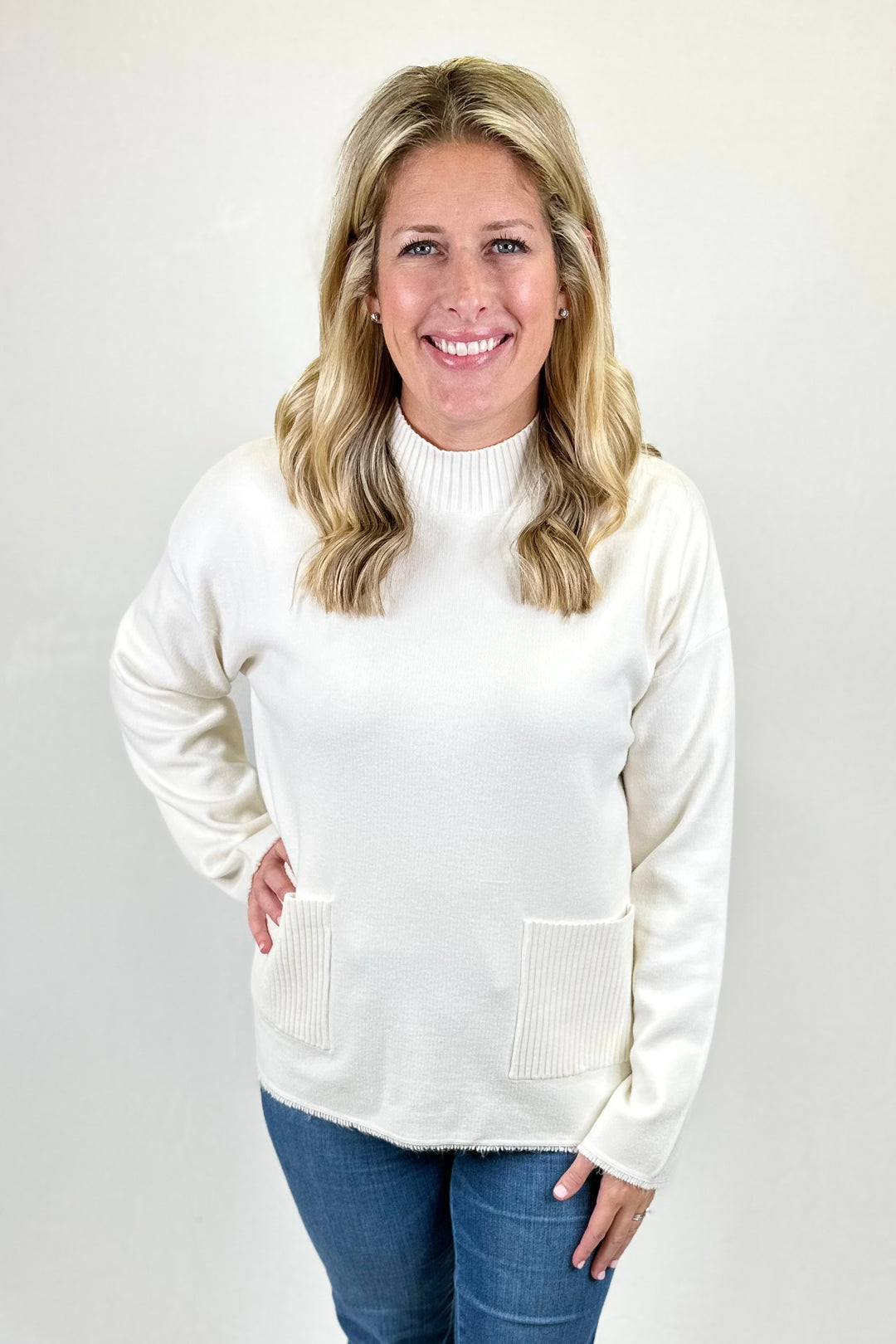 IVORY RIBBED NECKLINE POCKET SWEATER