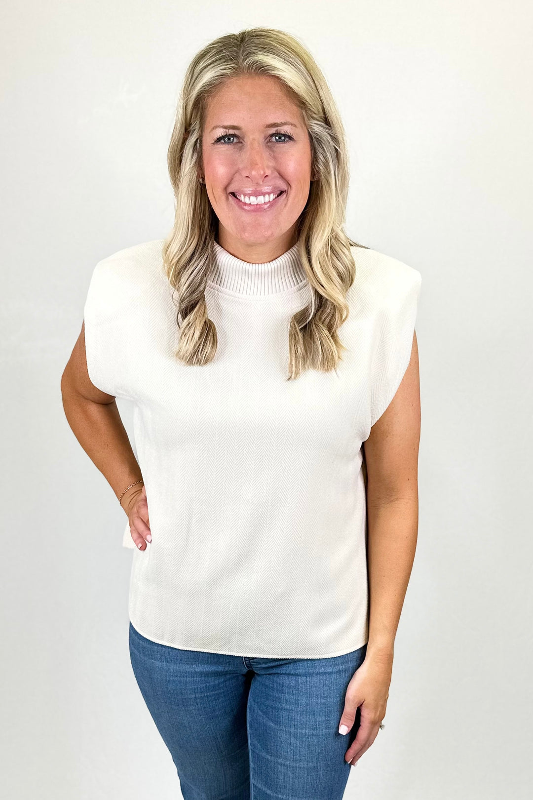 CREAM RIBBED MOCK NECK SLEEVELESS TOP