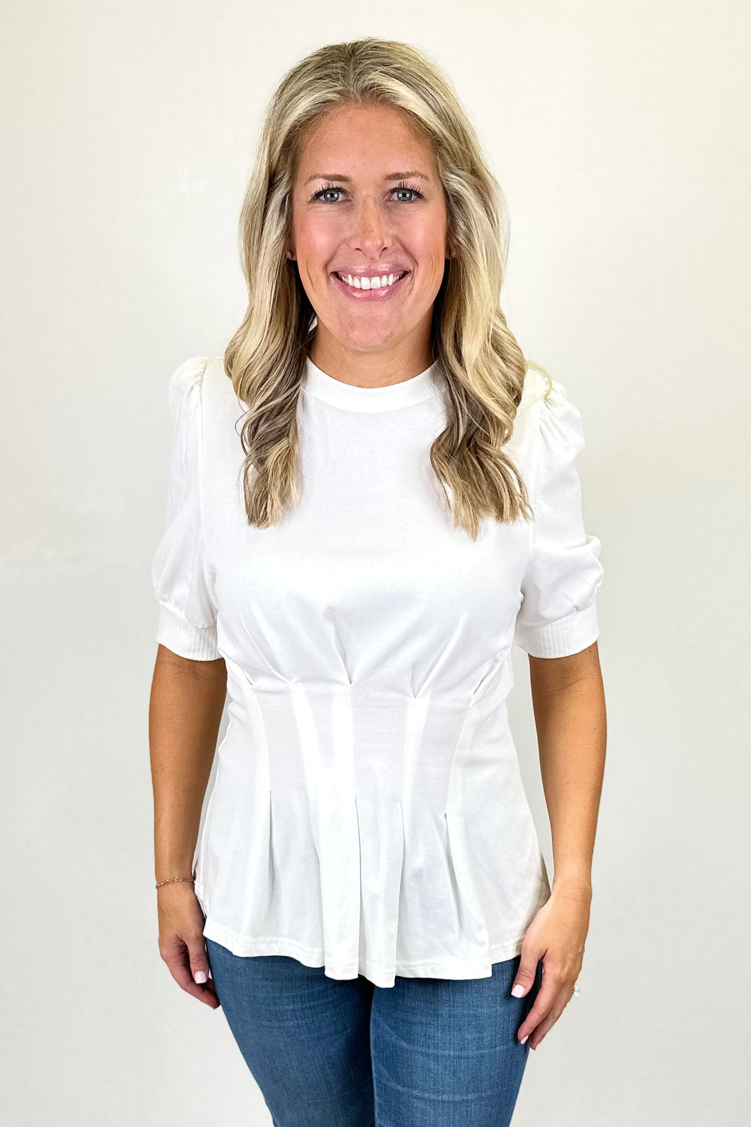 WHITE PLEATED PEPLUM TOP
