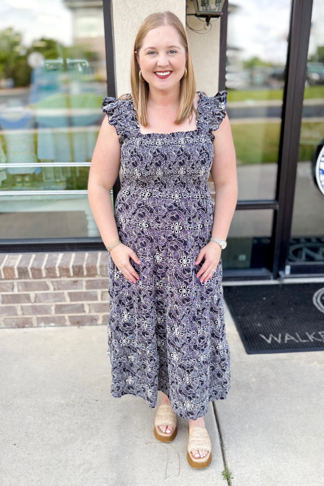NAVY EYELET SMOCKED MIDI DRESS
