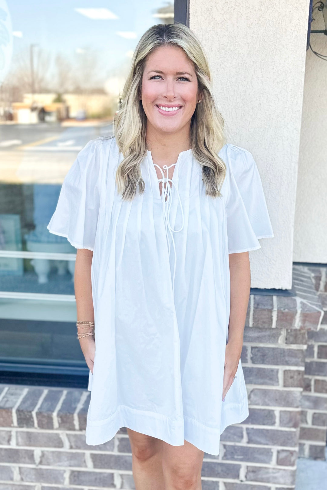 WHITE TUCK PLEAT TIE FRONT BABYDOLL DRESS