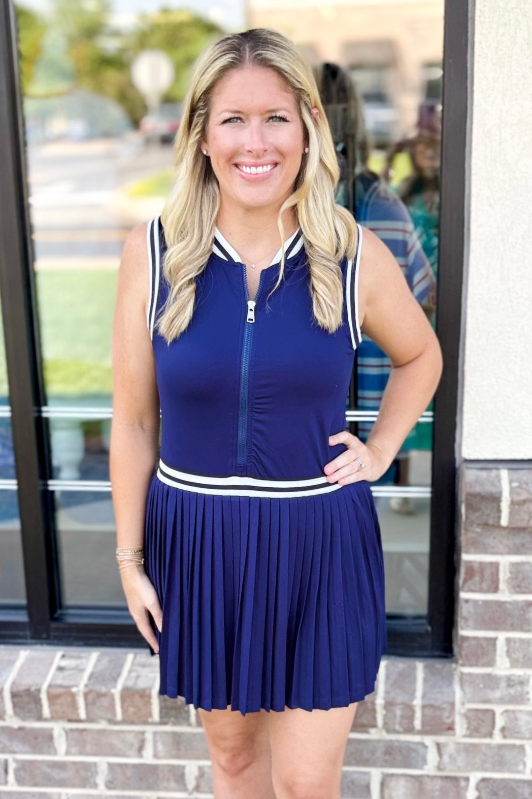 NAVY PLEATED SKIRT ZIP ATHLETIC DRESS