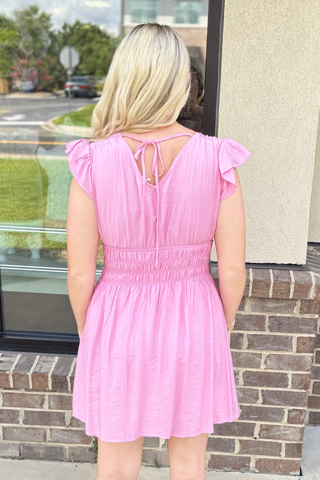 PINK SMOCKED WAIST RUFFLE VNECK DRESS