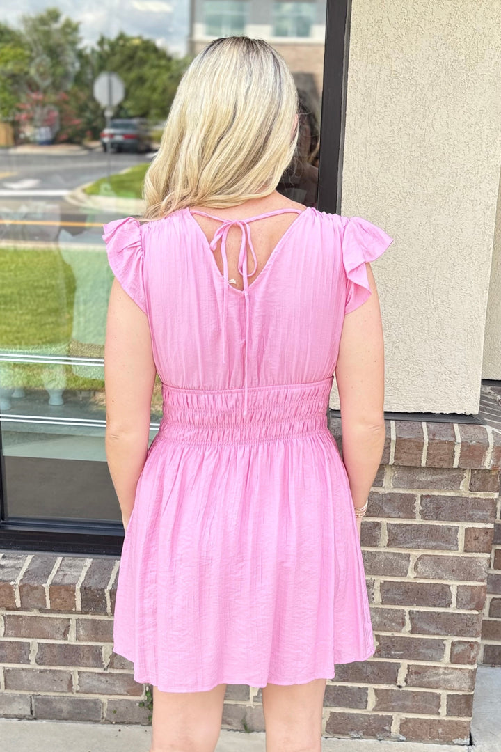 PINK SMOCKED WAIST RUFFLE VNECK DRESS