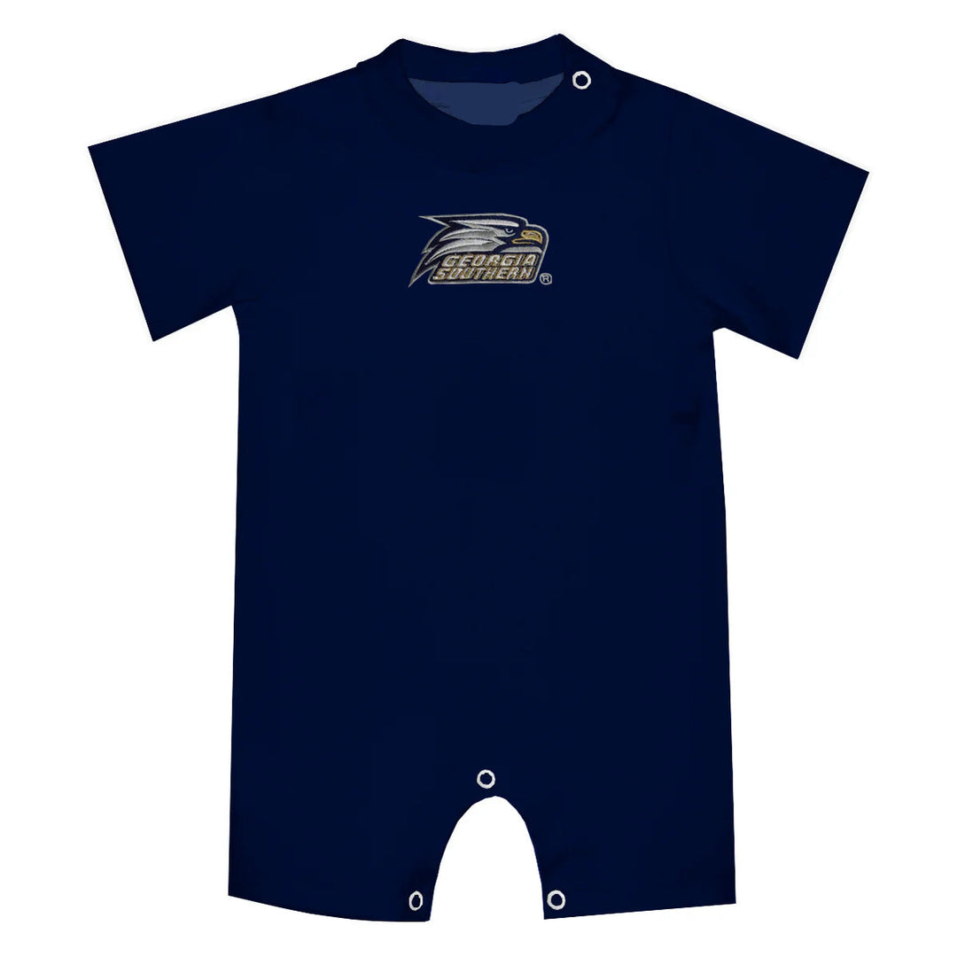 Navy blue baby romper with logo on a white background