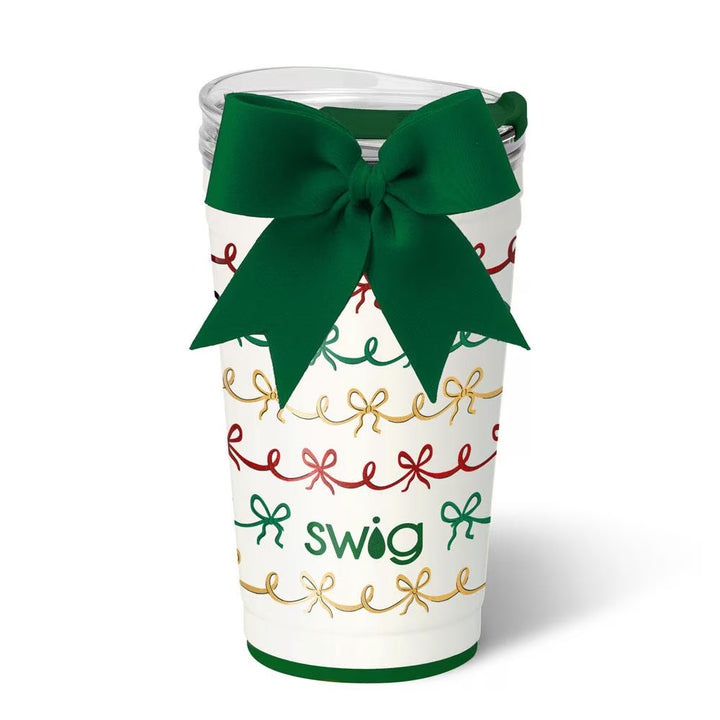 White tumbler with festive bow design and 'swig' branding on a white background