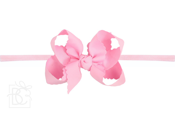 pink little girls head band bow