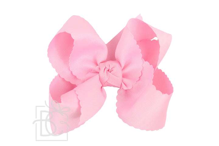 PINK SCALLOPED EDGE BOW