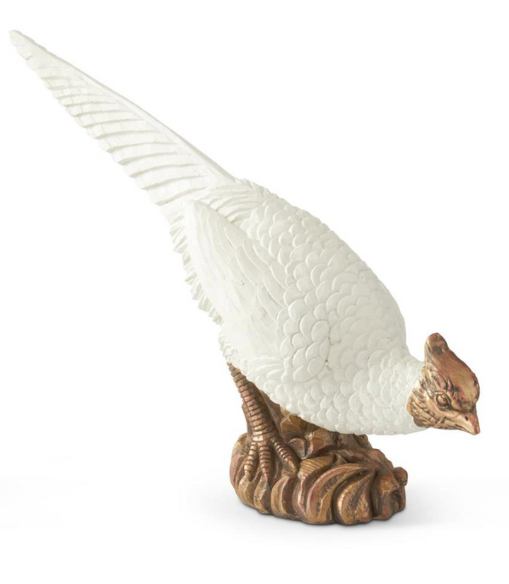 White ceramic pheasant figurine on a white background