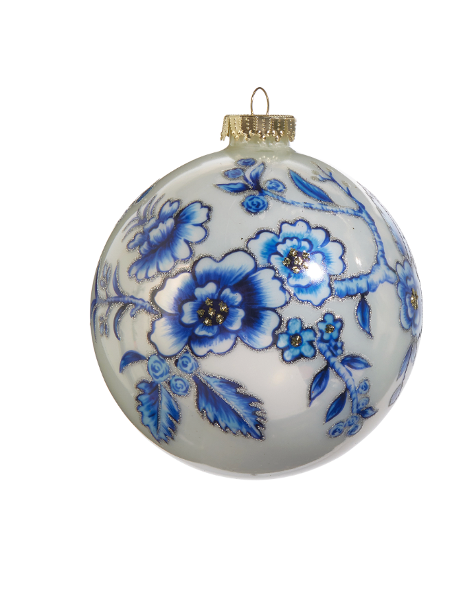 Decorative Christmas ball ornament with blue floral patterns on a white background