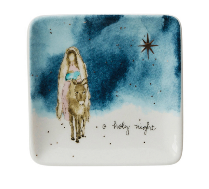 Decorative plate with a nativity scene illustration and 'o holy night' text on a blue and white background.