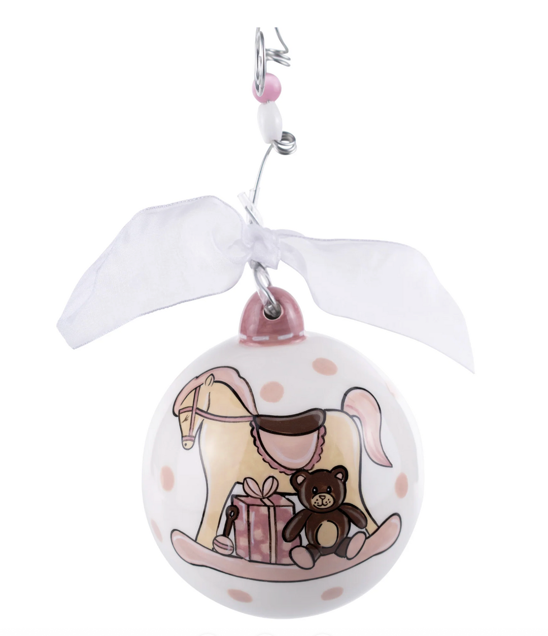 Decorative ornament with a rocking horse and teddy bear design on a white background
