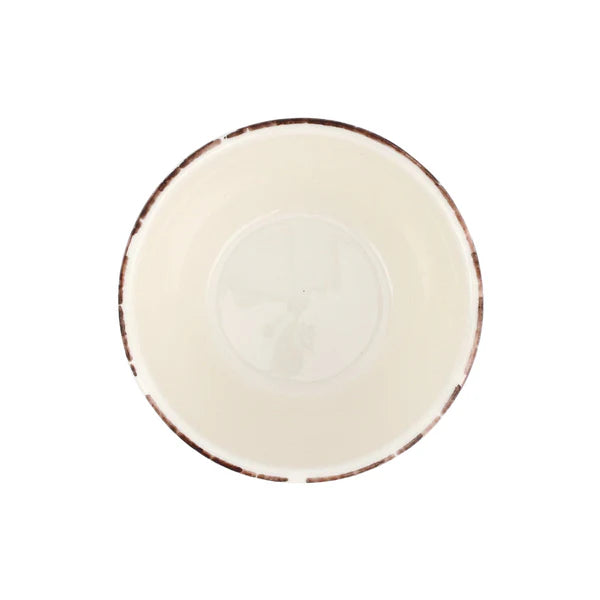 Inside view of bowl with a brown rim on a white background