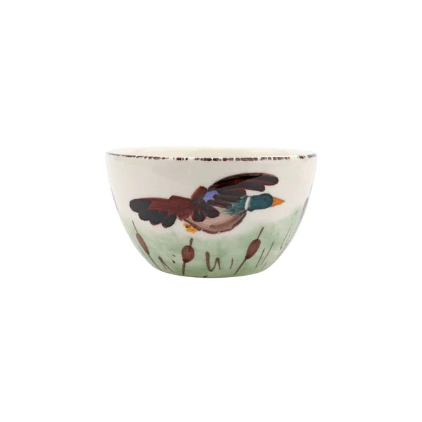 Ceramic bowl with a bird design on a white background