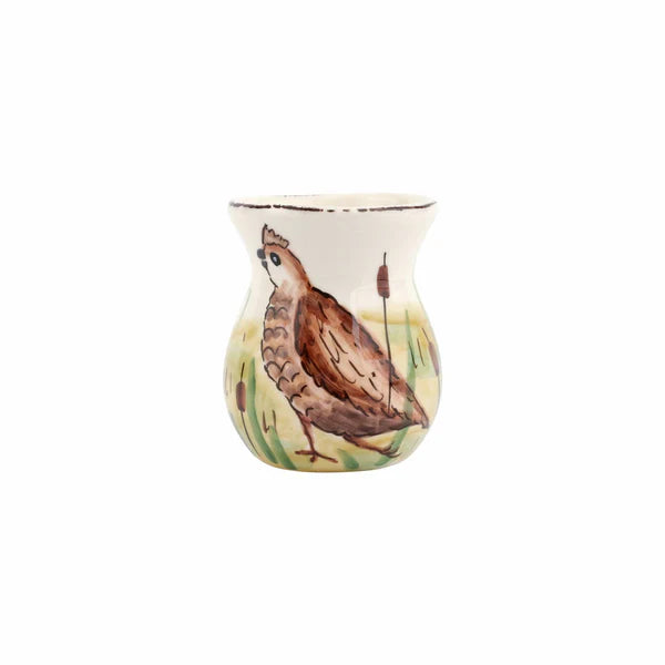 Ceramic vase with bird design on a white background