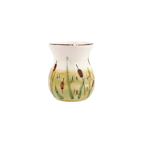 Decorative vase with nature-themed design on a white background