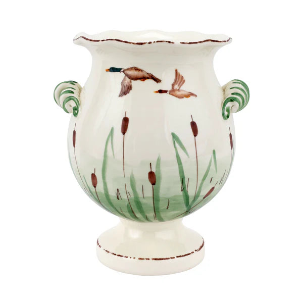 Decorative vase with duck and reed design on a white background
