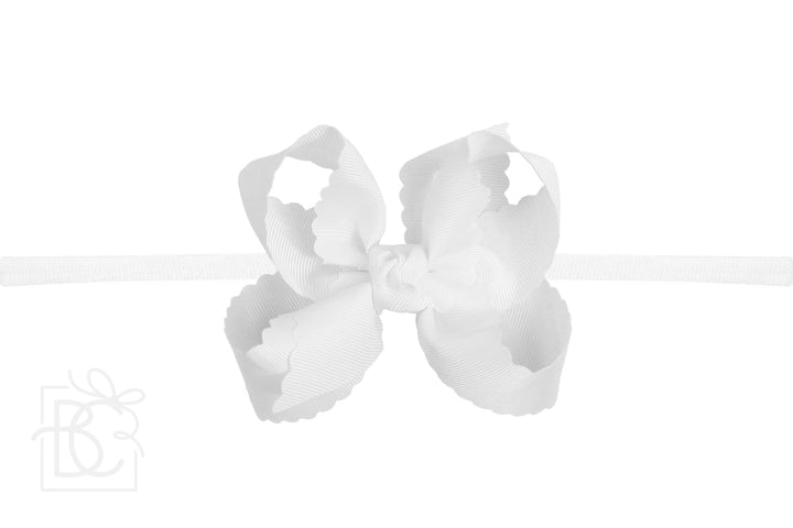 WHITE SCALLOPED EDGE PANTYHOSE HEADBAND BOW
