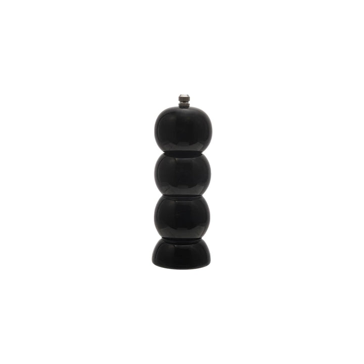 Black pepper grinder on a white background