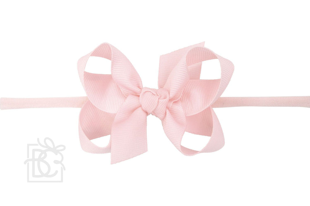 LIGHT PINK PANTYHOSE HEADBAND WITH BOW