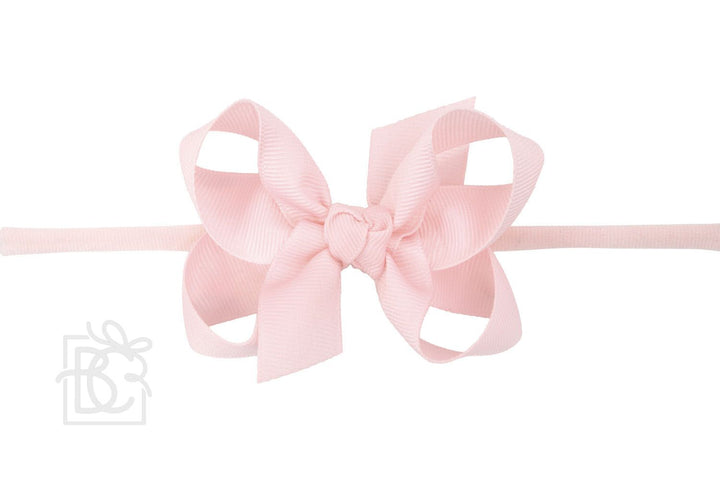 LIGHT PINK PANTYHOSE HEADBAND WITH BOW