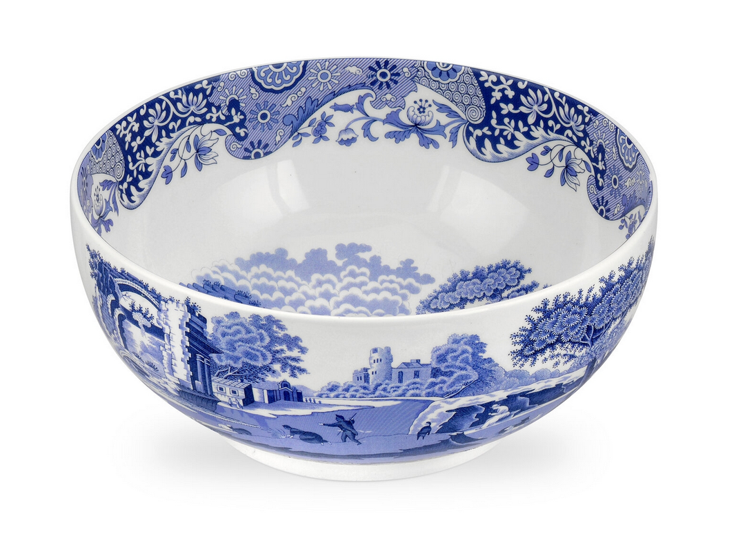 A Spode Blue Italian deep round porcelain bowl with a floral and landscape pattern in blue on a white background.