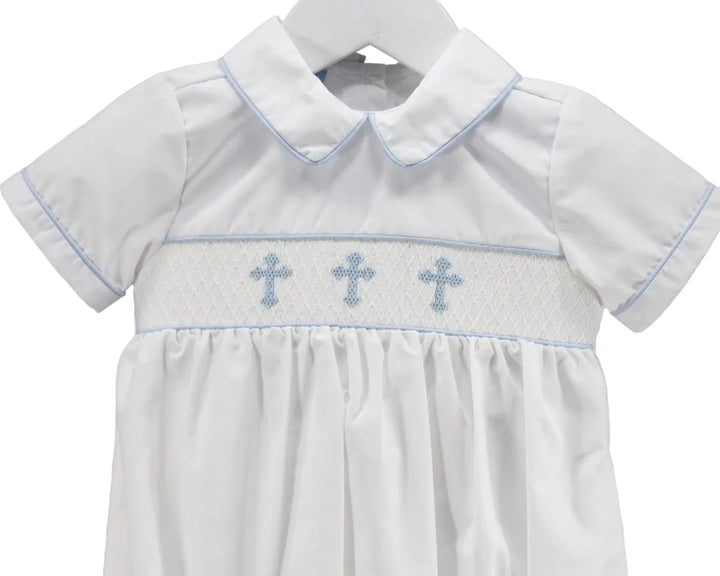 LITTLE BOY COLLARED BUBBLE WITH SMOCKED BLUE CROSSES ON WHITE BACKGROUND DETAILED VIEW