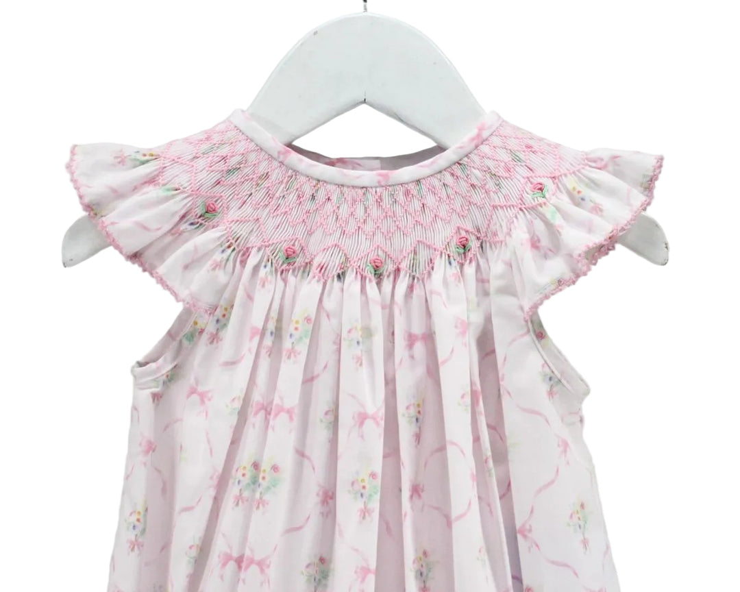 FLORAL PINK BUBBLE WITH SMOCKING DETAIL ON WHITE BACKGROUND DETAILED VIEW