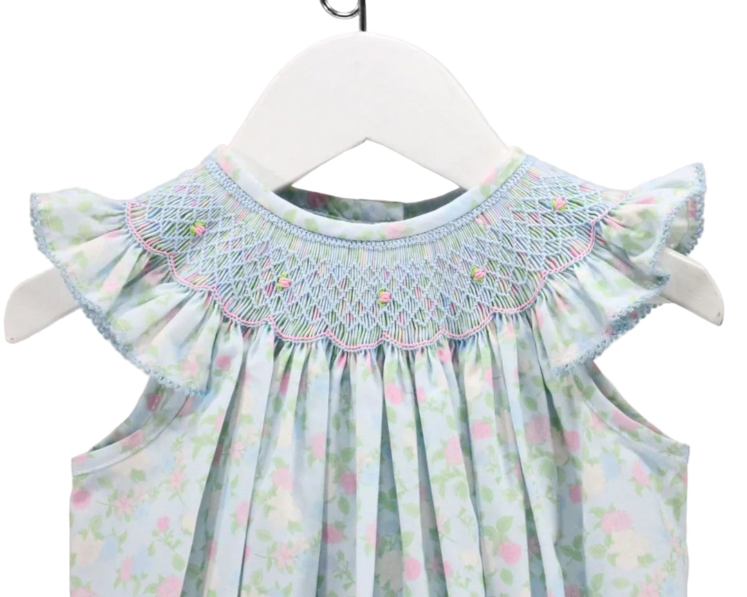 CLOSE UP DETAIL SHOT OF SMOCKING ON FLORAL BUBBLE