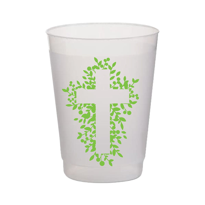 Clear plastic cup with green leaf pattern on a white background