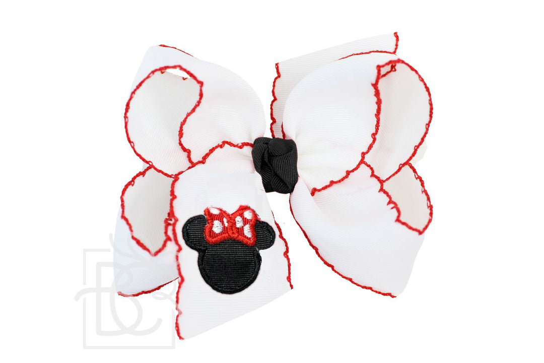 White bow with red accents and a black center on a white background