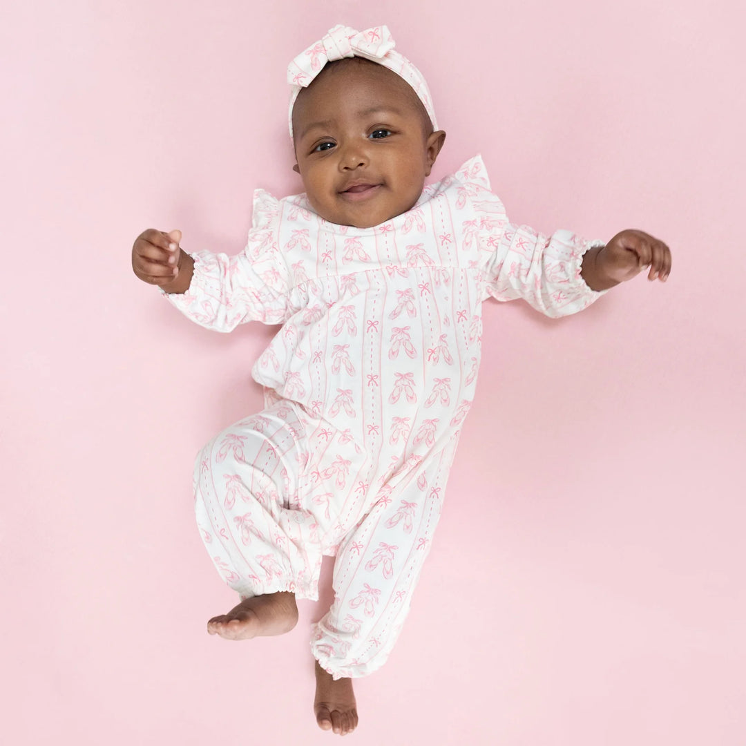 Angel Dear Ballet Shoes Ribbon Stripe Ruffle Sleeve Snap Romper worn by a baby in a lifestyle view highlighting the ballet shoes ribbon stripe snap design in an additional catalog photo