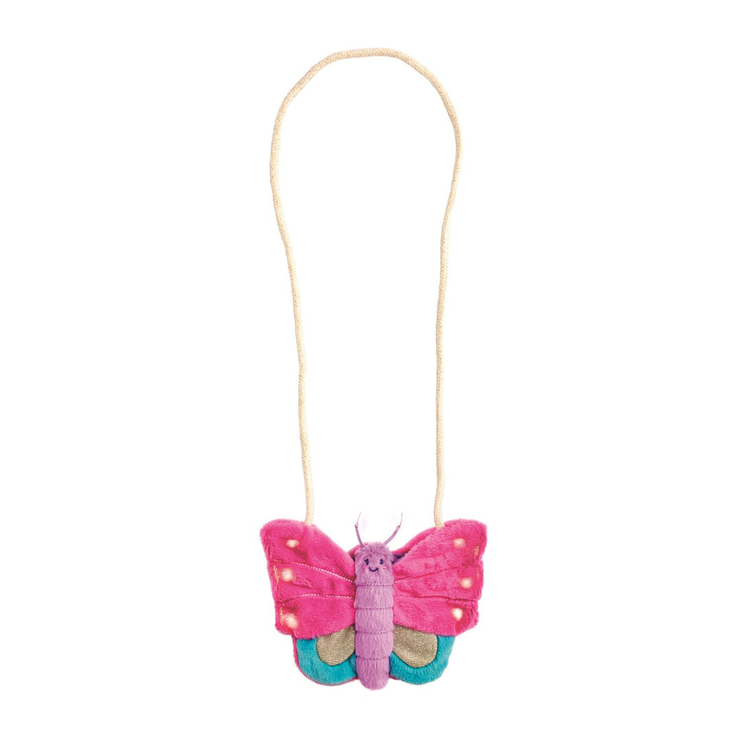 Pink butterfly purse with LED lights on a white background