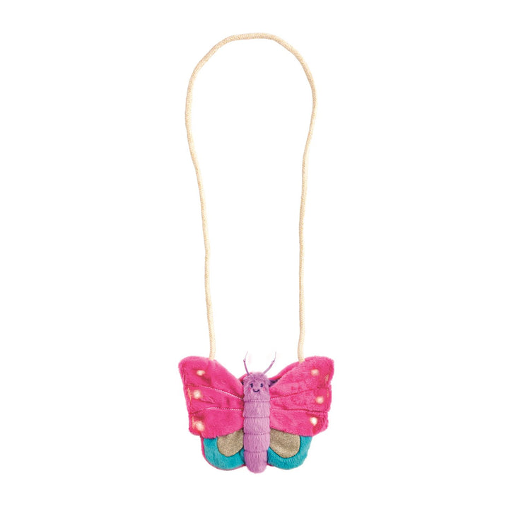 Pink butterfly purse with LED lights on a white background