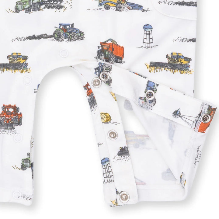 Angel Dear Farm Machines Uni Romper close-up of the baby romper highlighting the print, closures, and finishing details
